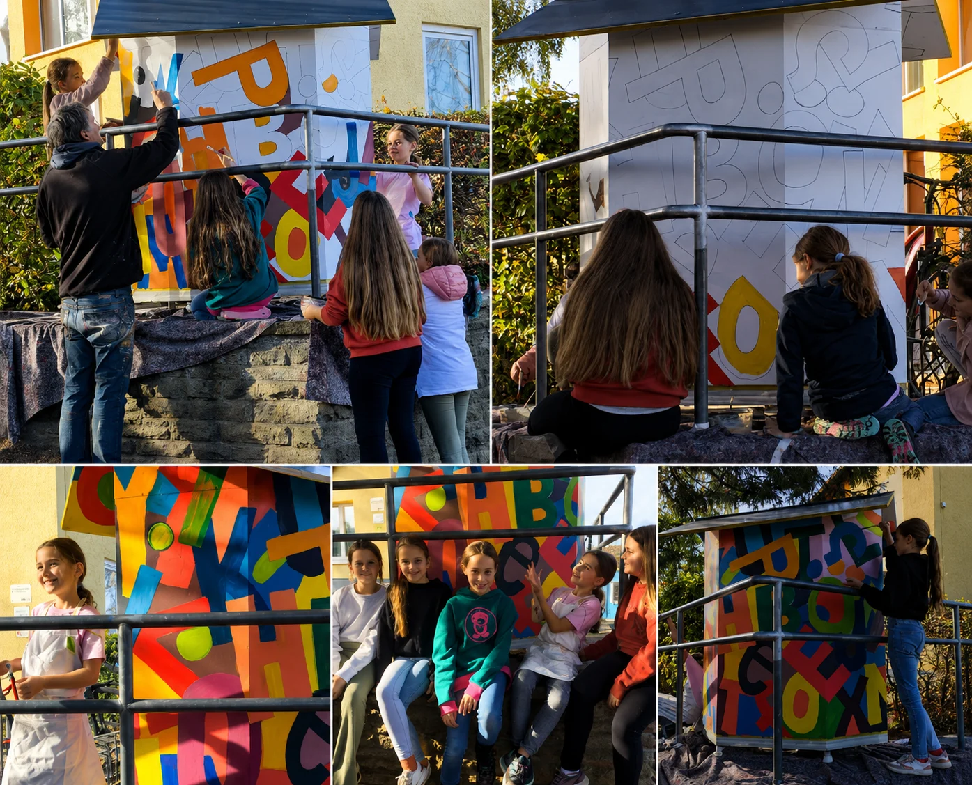 Kinder gestalten gemeinsam mit dem Künstler Axel Plöger den bunten Kinderbücherschrank auf dem Schulhof der Grundschule Hiddesen